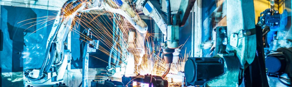 Welding robots movement in a car factory
